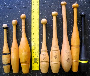 Vintage clubs (L) next to modern 3/4-1 Pound Indian Clubs (R)